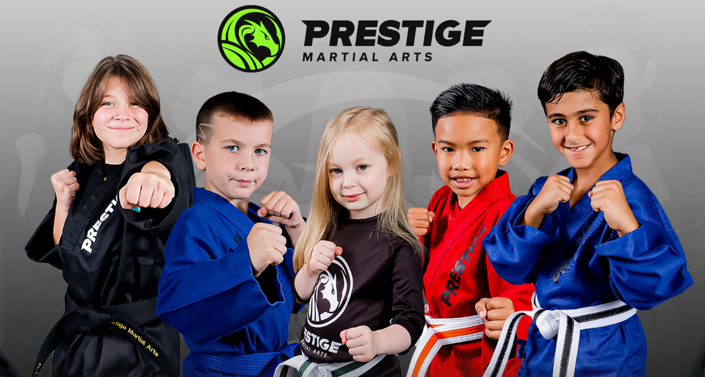Large Prestige Martial Arts picture with many students posing in karate stances.